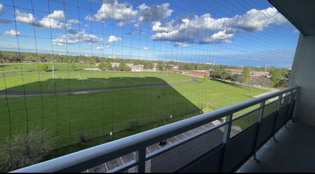 Protected balcony overlooking park